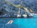 White boats in blue sea of Ã¢â¬â¹Ã¢â¬â¹sardinia with spectacular rocks Royalty Free Stock Photo